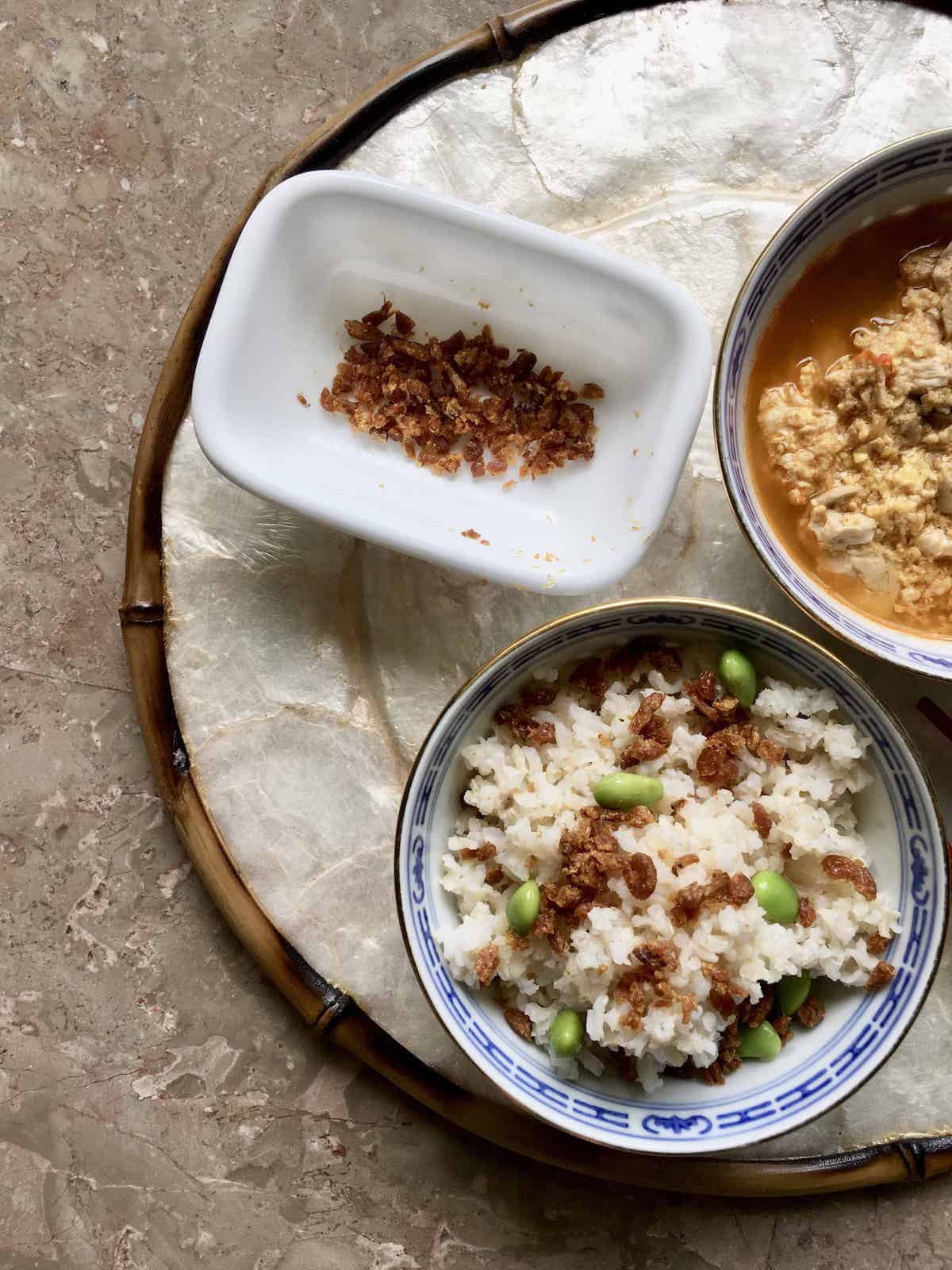 Dried shrimp that has been cut and fried sprinkled on brown rice.