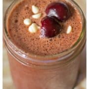 Close-up of a brown coconut water chocolate drink.