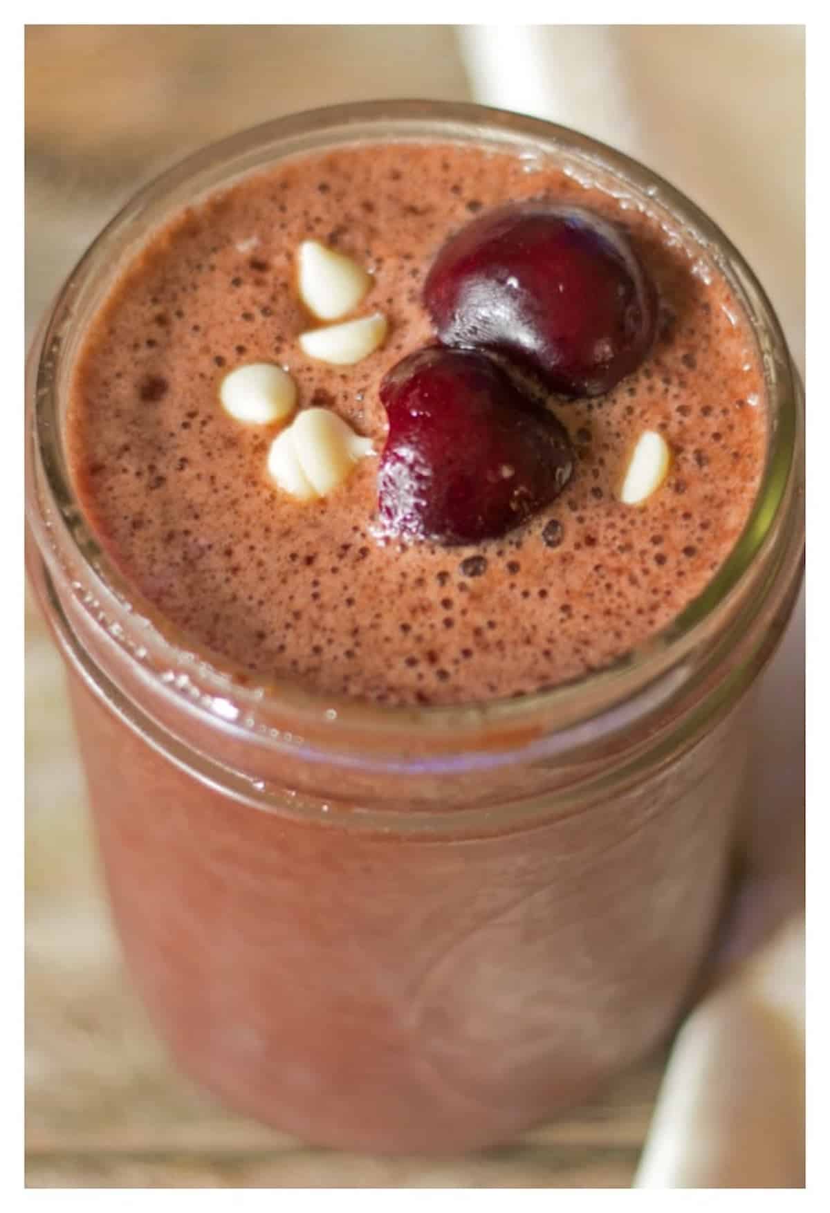 Close-up of a brown coconut water chocolate drink.