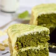 Close-up of a slice of matcha cake .