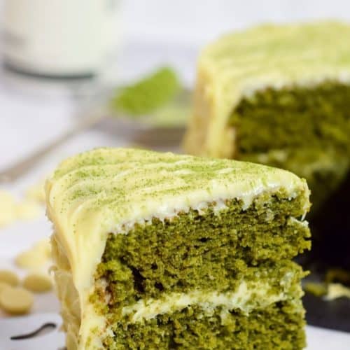 Close-up of a slice of matcha cake .