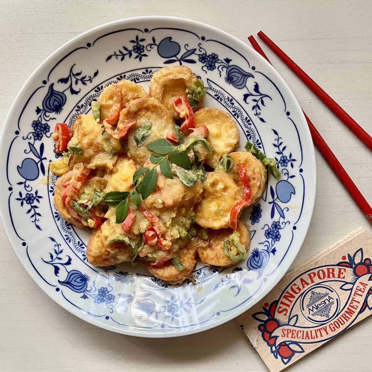 Salted egg yolk tofu with a box of tea.