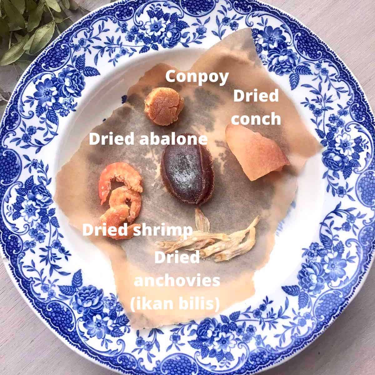 Dried scallop substitues on a plate, with the names labelled on the ingredients.