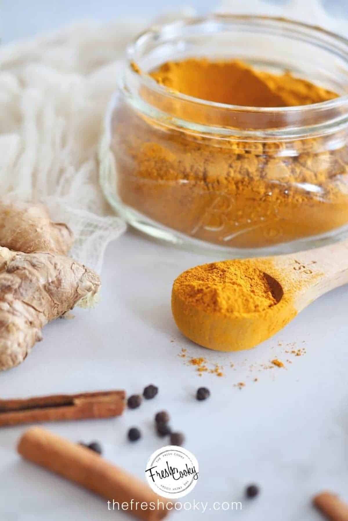 A spoonful of golden milk spice, or turmeric tea, mix.