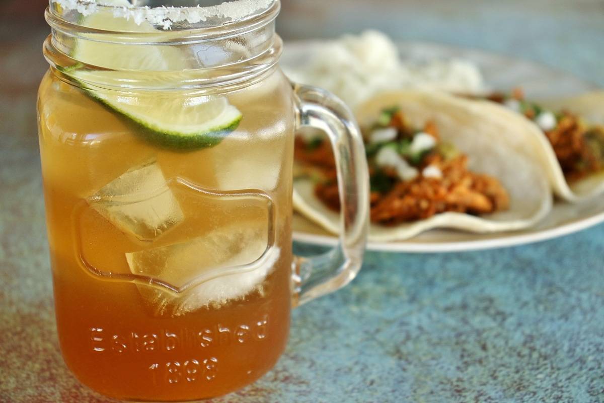 Close-up of a tamarind margarita cocktail.