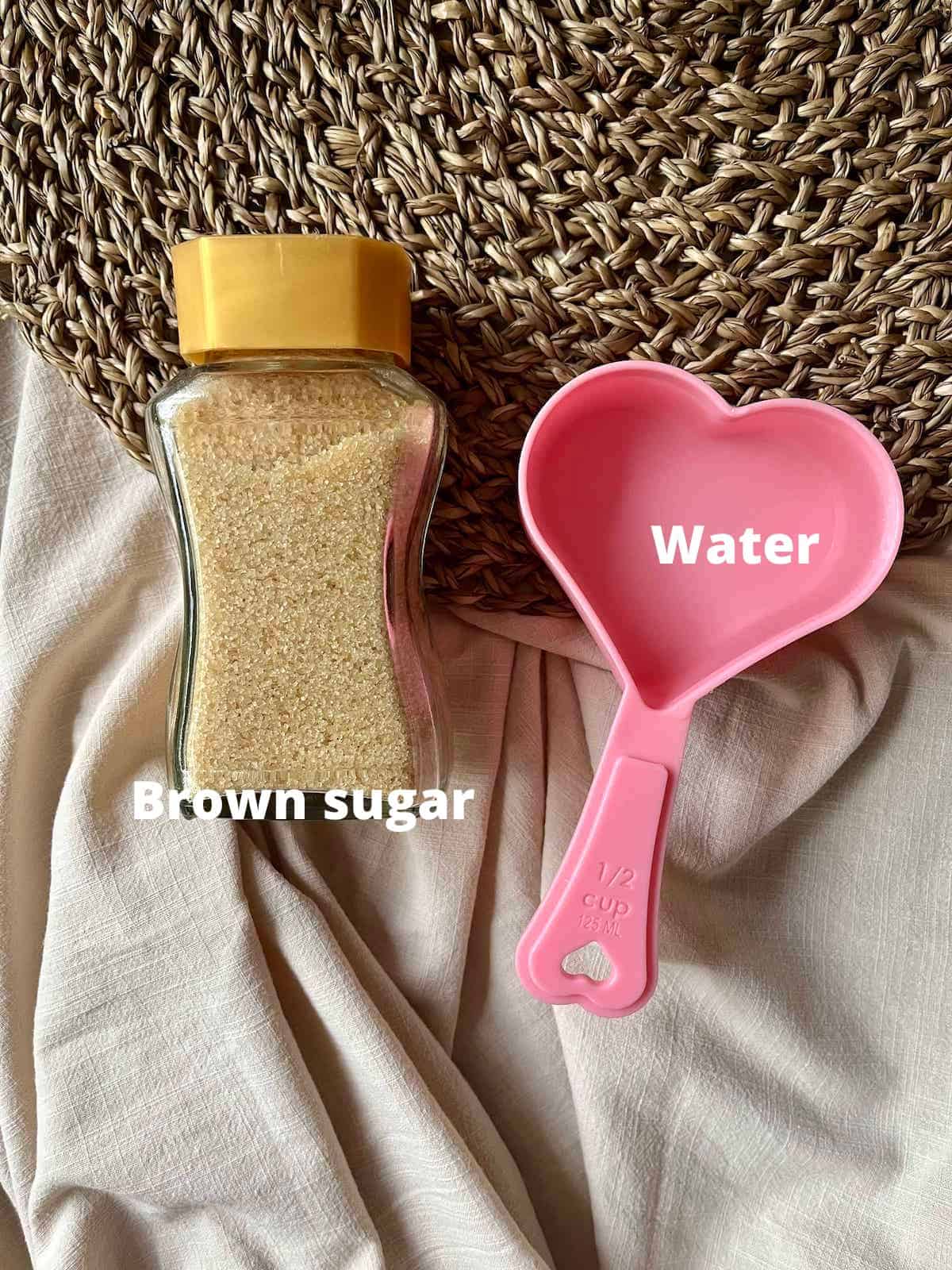 A photo of the brown sugar and water you need for milk tea brown sugar sauce.