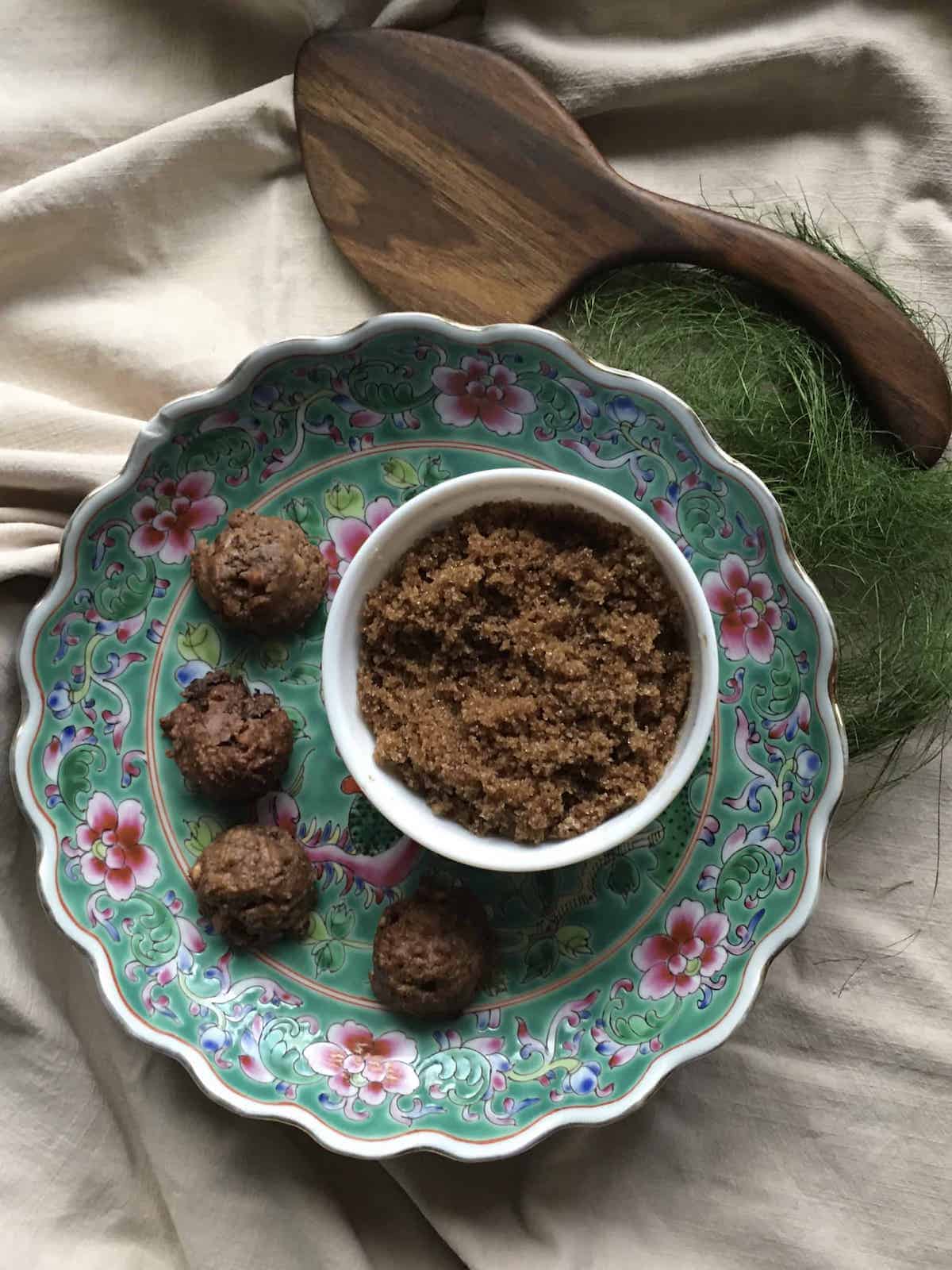 Homemade brown sugar next to cookies made with it.