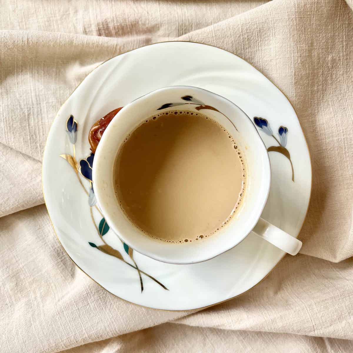 Overhead shot of a cup of Hong Kong coffee milk tea.