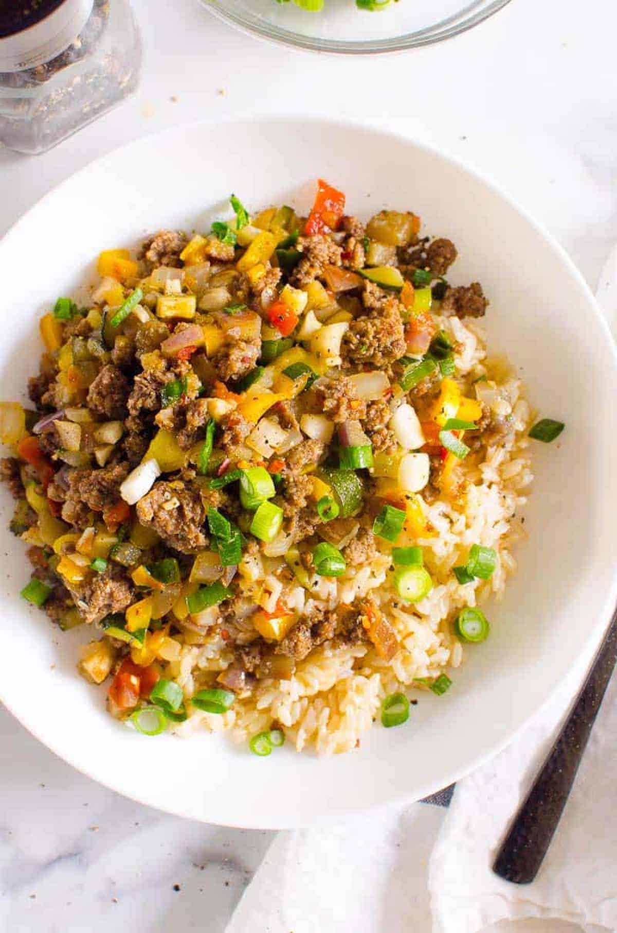 A bowl of Korean-inspired rice mixed with beef.