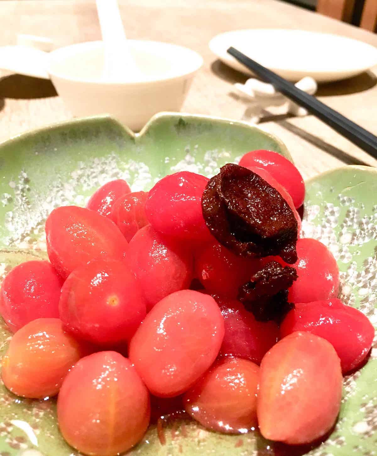 Close-up of Taiwanese tomatoes with Chinese preserved plum.