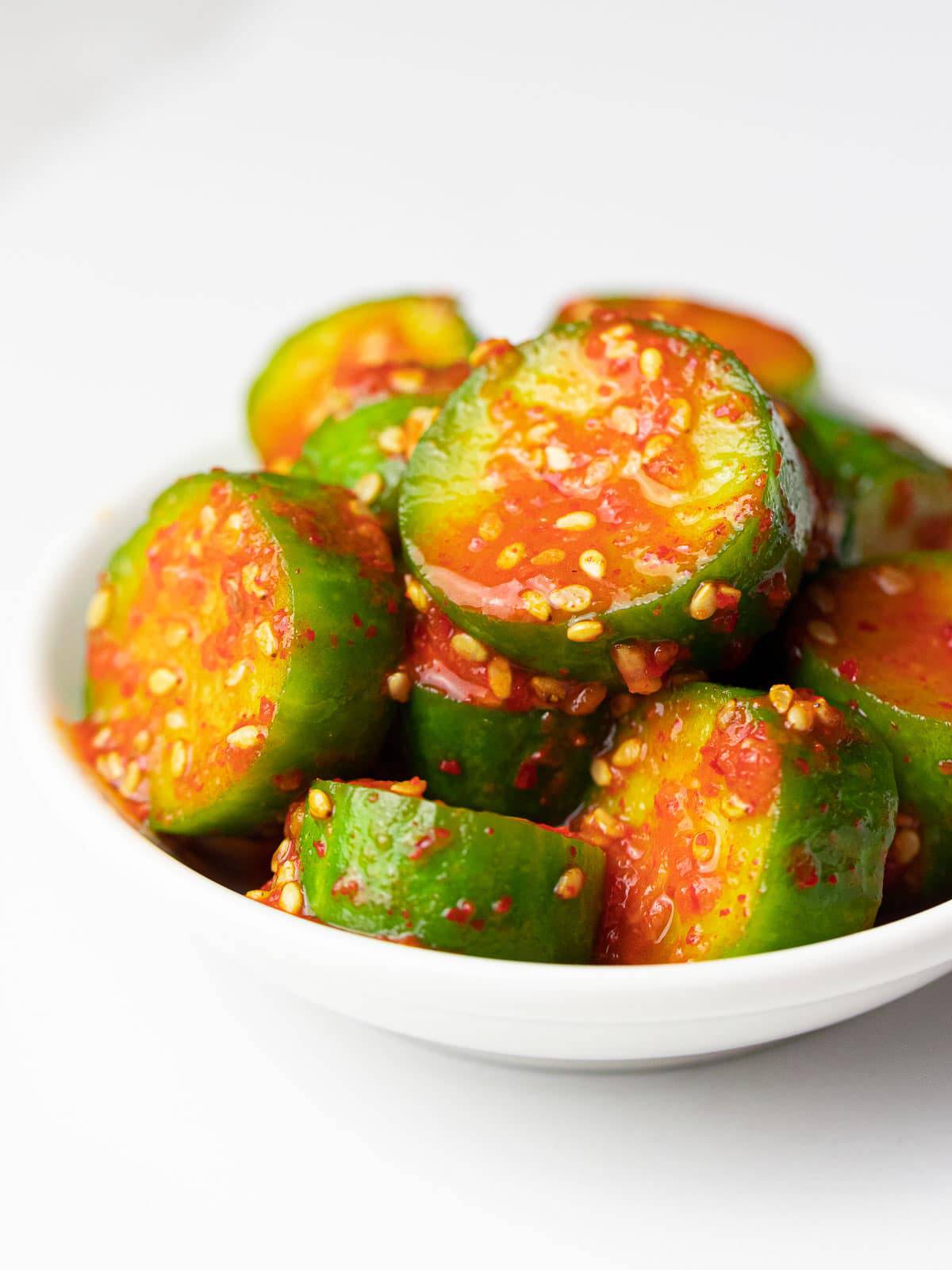 Close-up of Korean spicy cucumber slices.