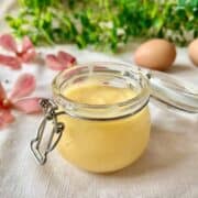 Homemade calamansi lime curd in a glass jar.