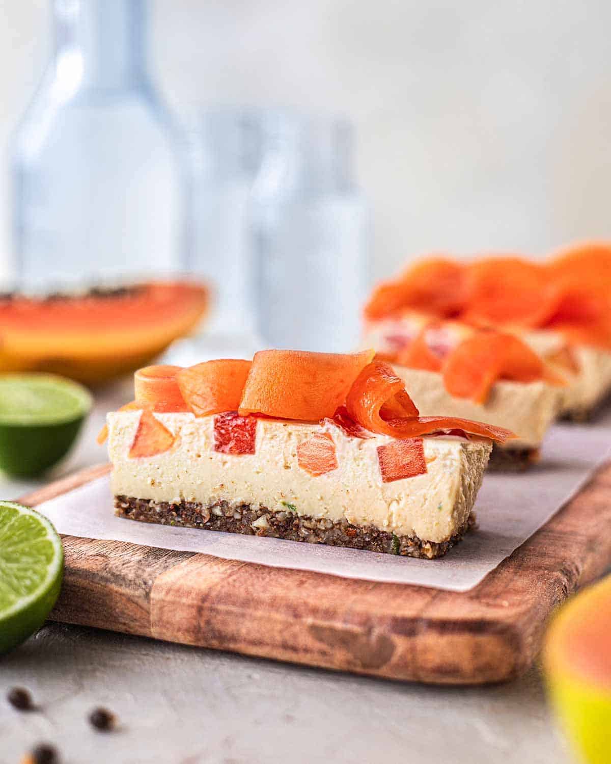 Side view of 2 slices of papaya lime cake.