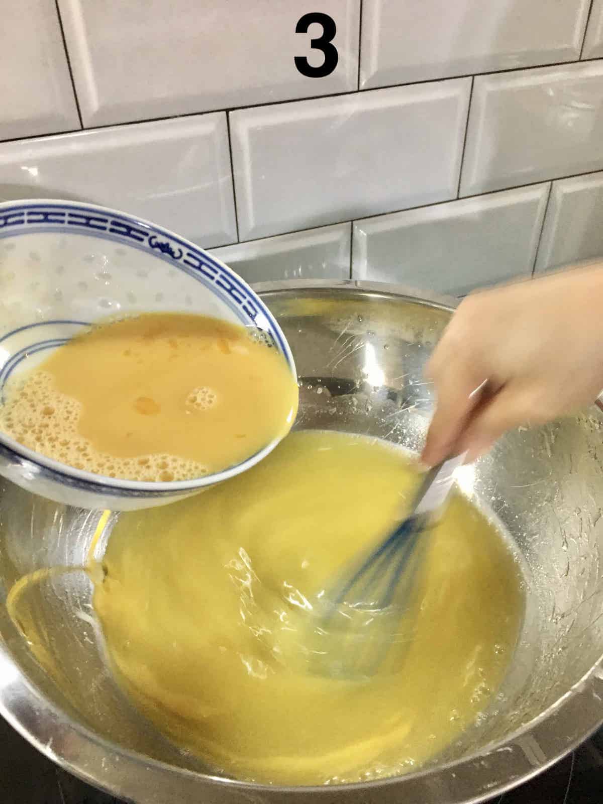 Slowly adding mixed eggs into lime juice, sugar and butter.