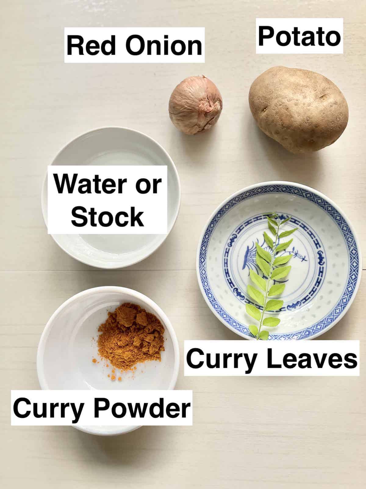 The ingredients for curry puff potato filling next to each other.