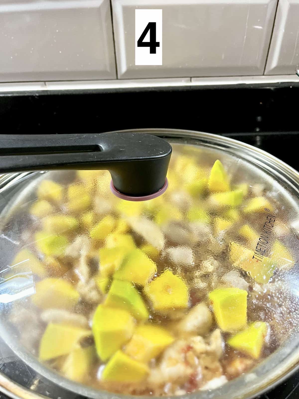 Braising the pumpkin and chicken bites till tender.