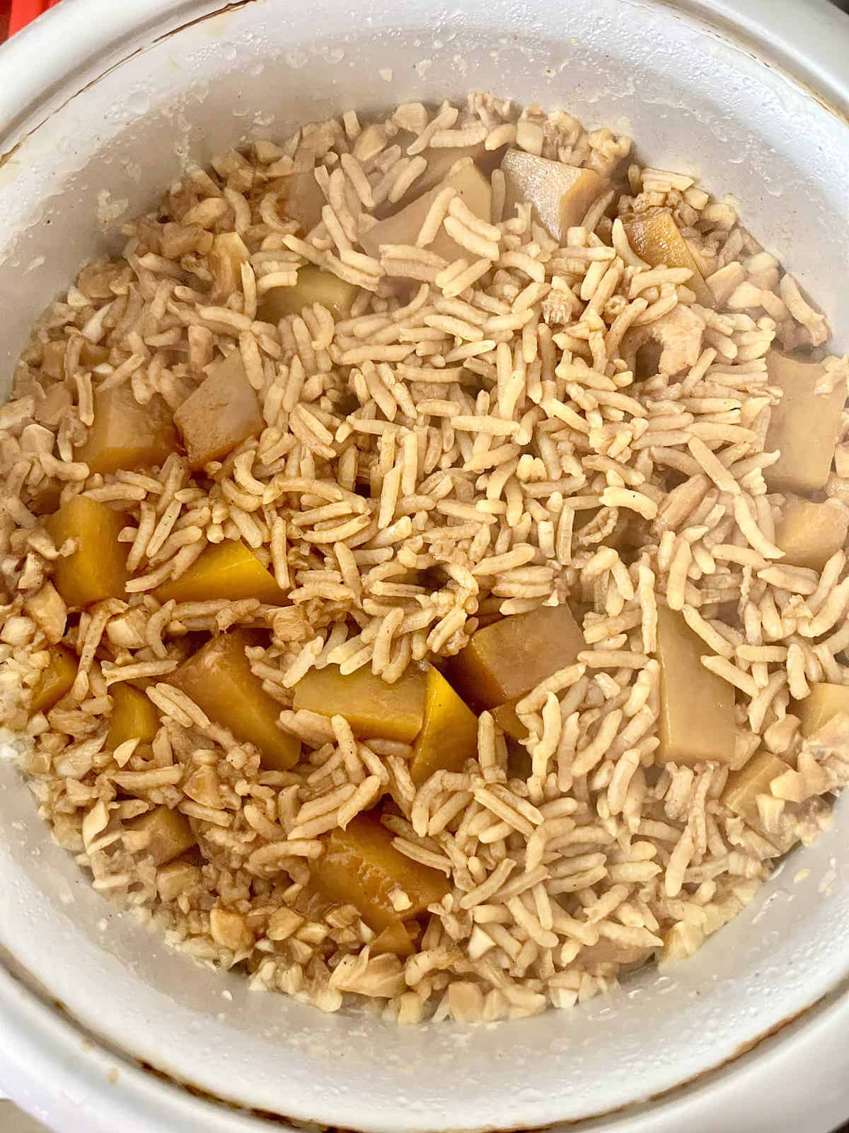 Cooked Chinese pumpkin rice in the rice cooker.