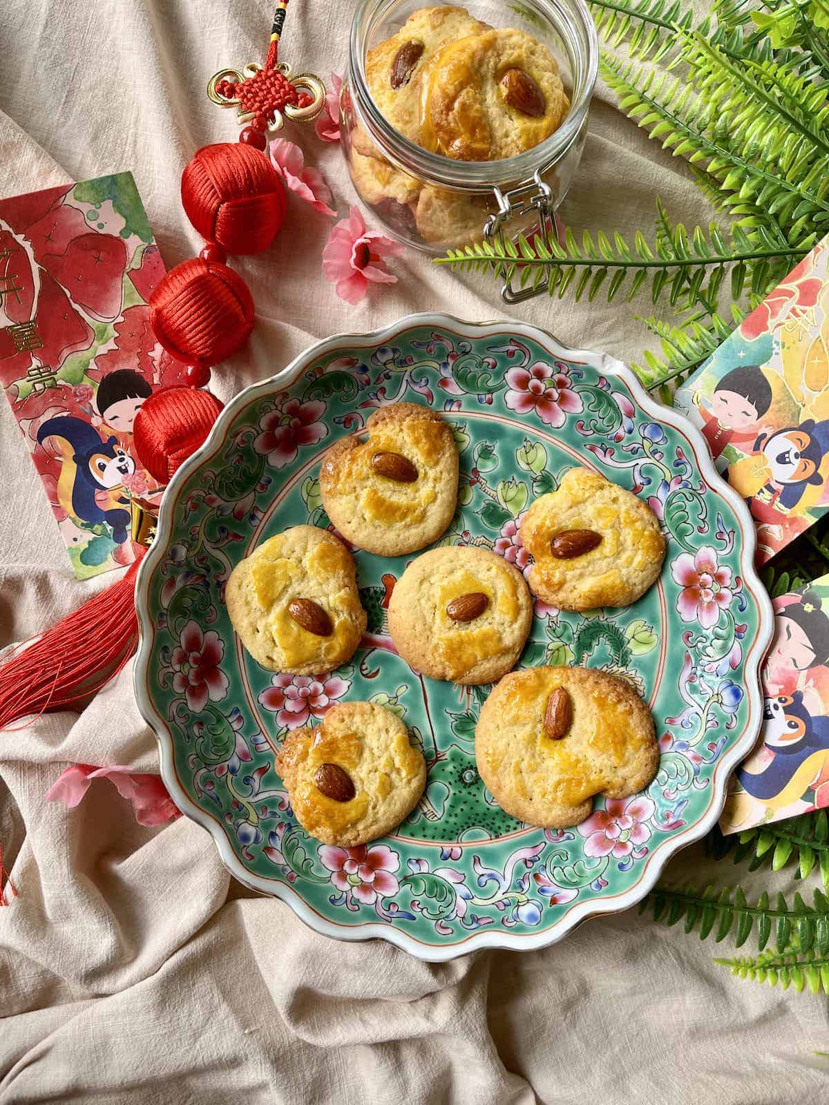 6 American style Chinese walnut cookies on a Peranakan plate.