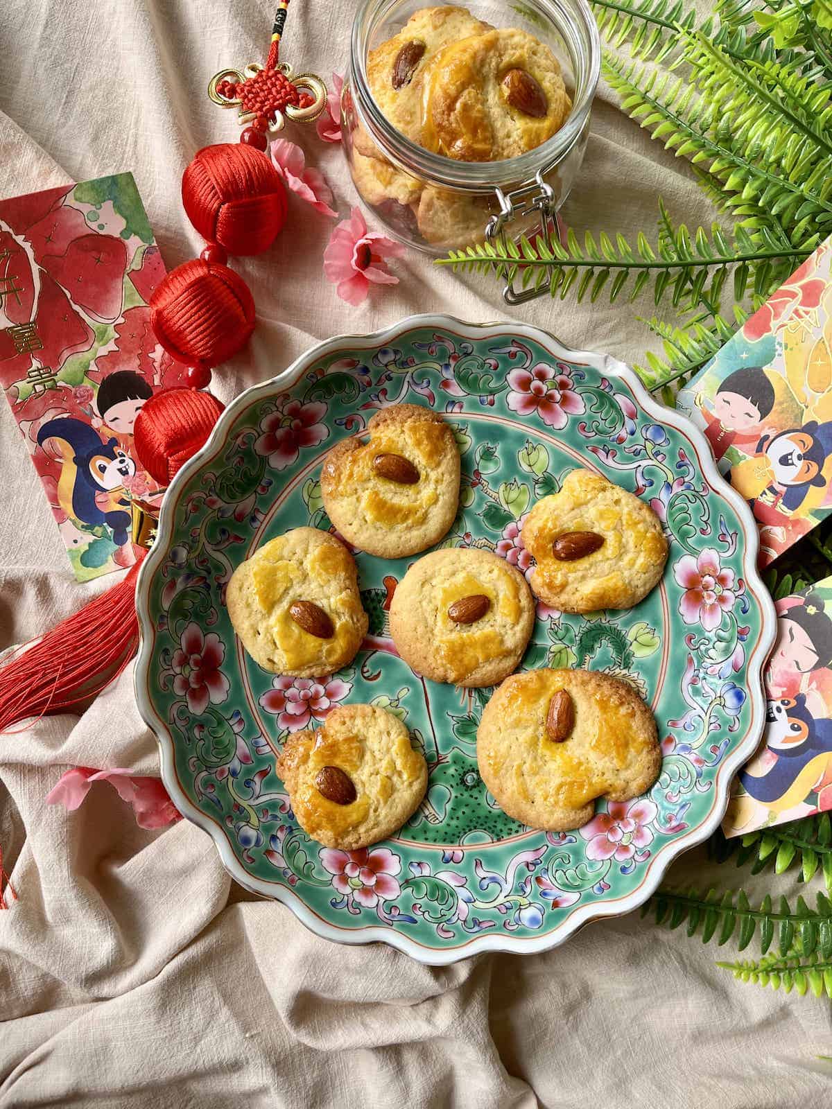 6 American style Chinese almond cookies on a Peranakan plate.