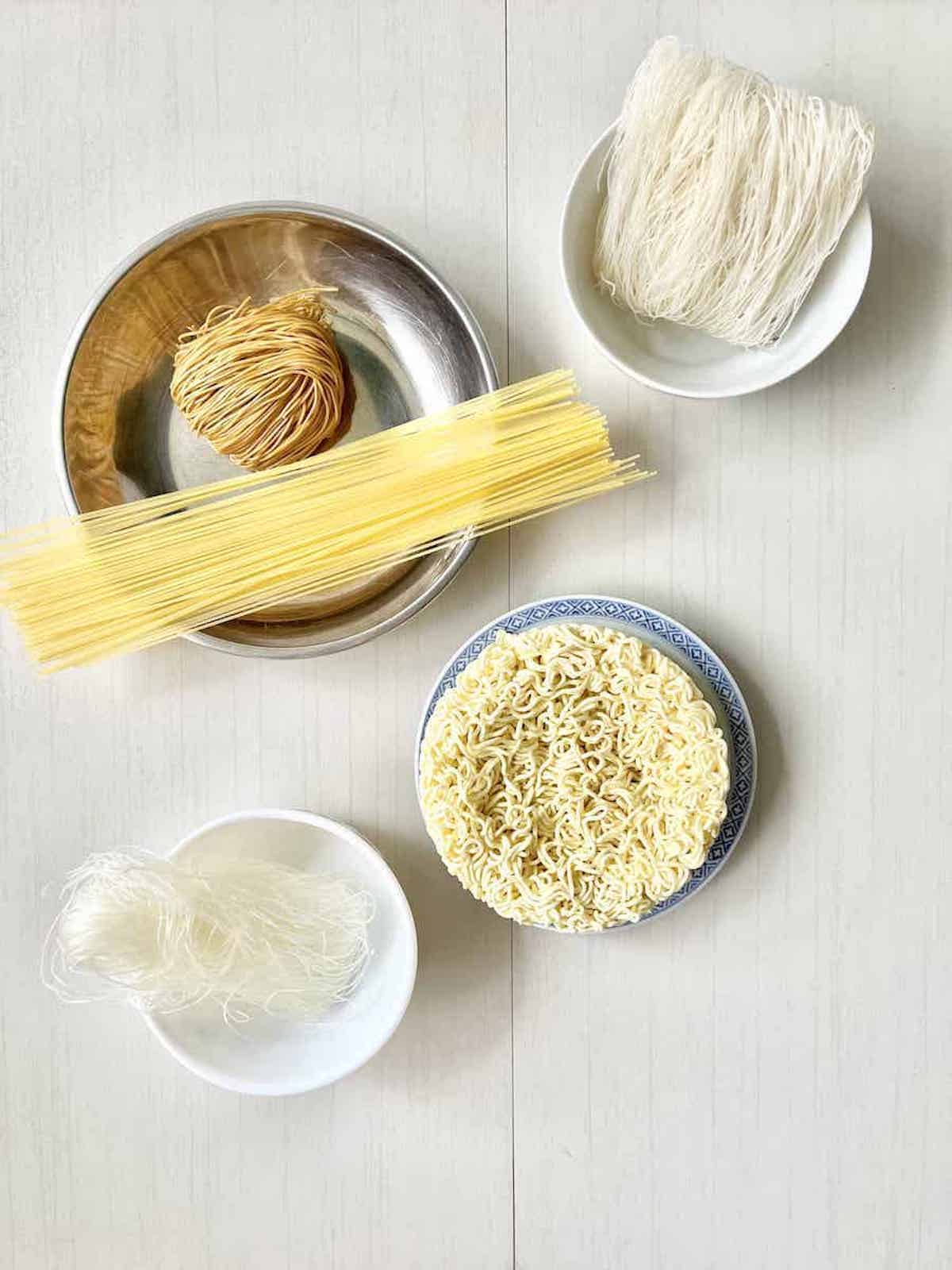 Various types of thin noodles, including egg noodles, glass noodles and rice noodles.