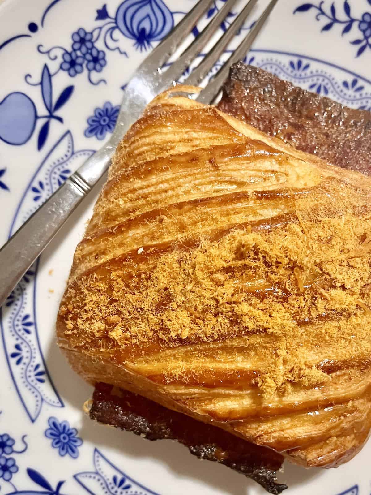 Chinese pork Bak Kwa in a square croissant.