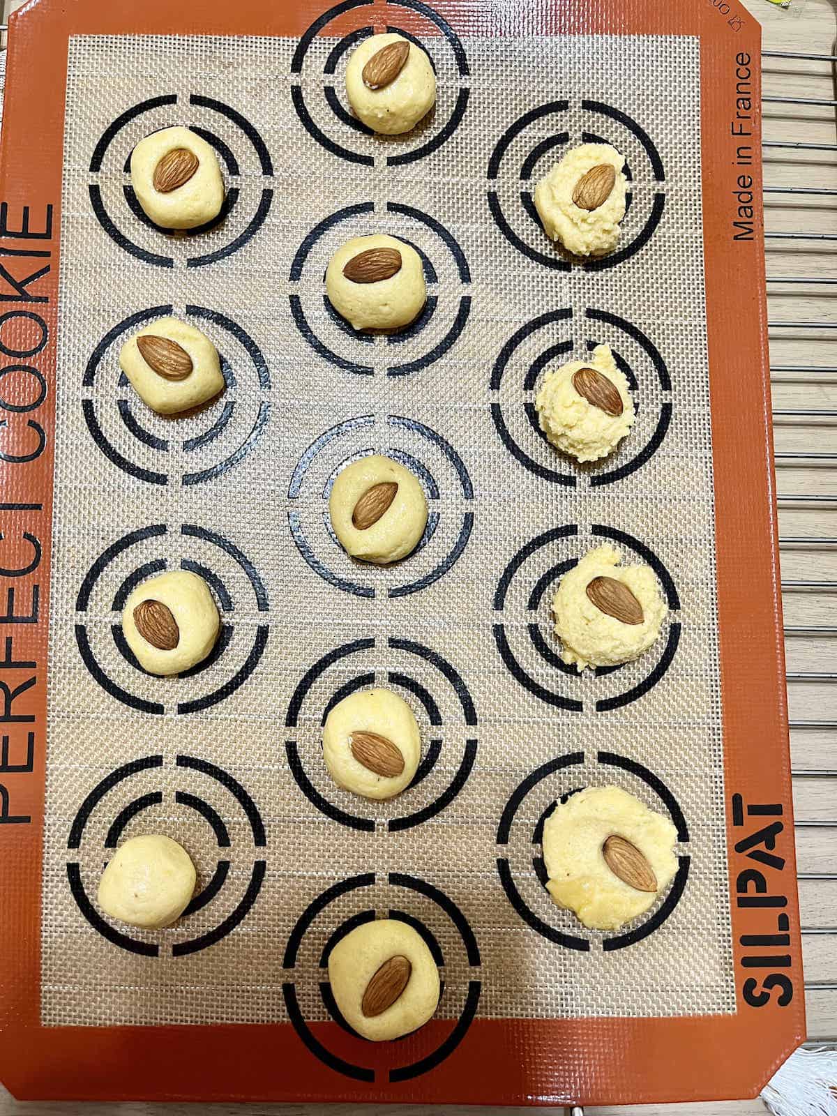 Cookies on a Silpat baking sheet.