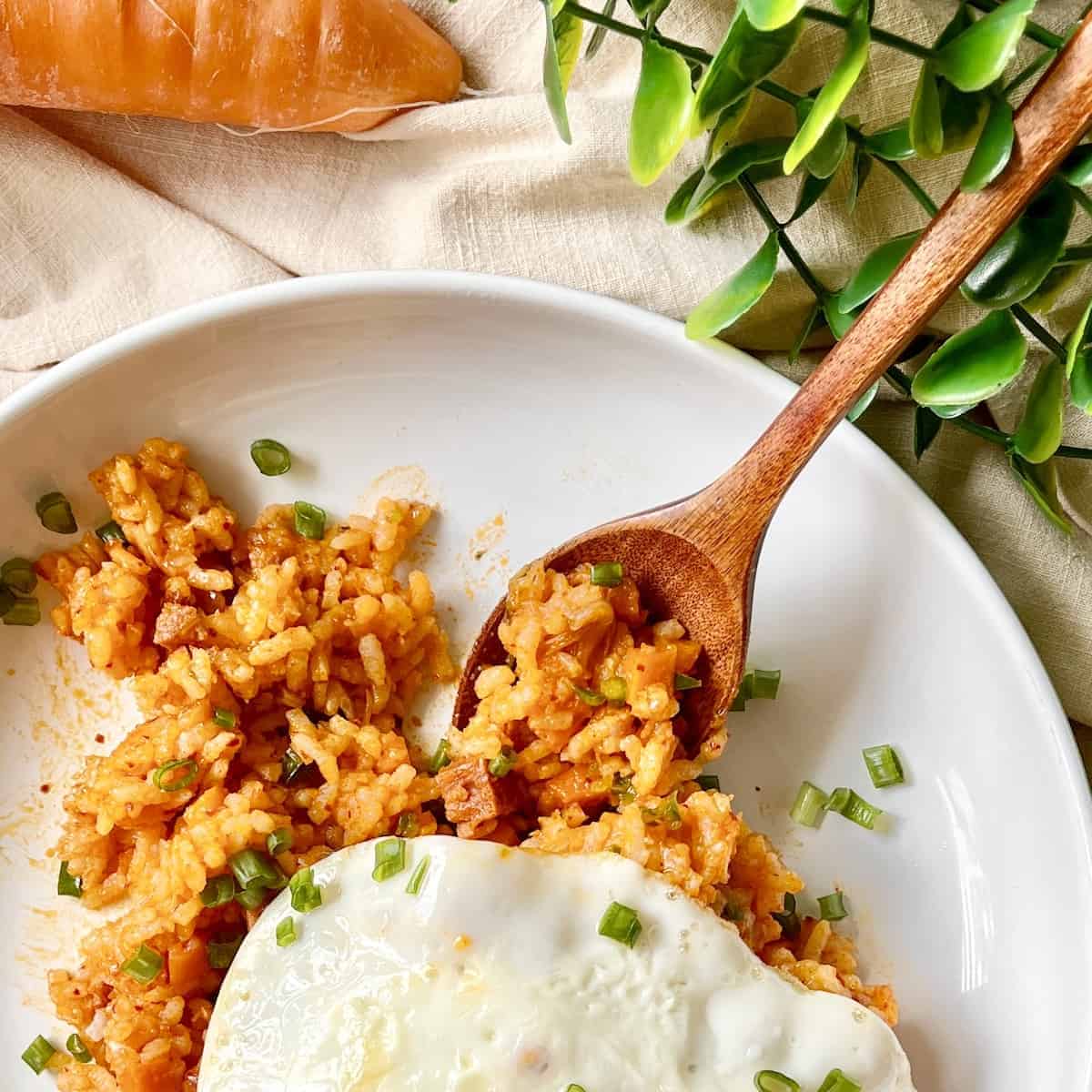 Close-up of a plate of Korean kimchi and gochujang fried rice