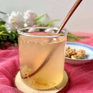 A glass of Japanese yuzu tea in a glass cup.