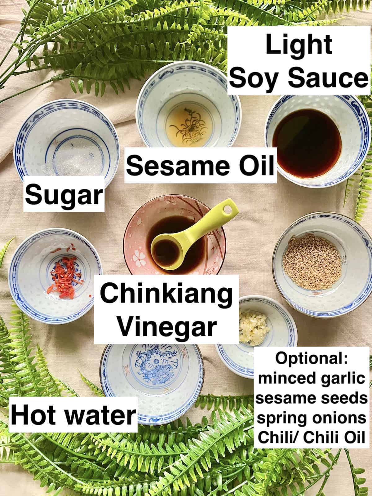 The ingredients for Chinese dipping sauce in bowls.