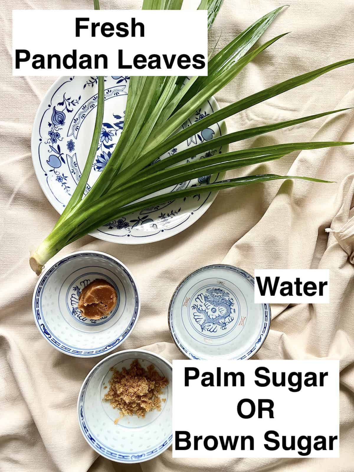 Pandan leaves next to water, palm sugar and brown sugar.