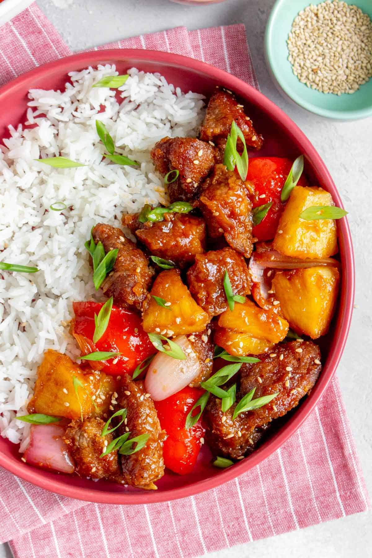 Overheat shot of sweet and sour pork and rice.