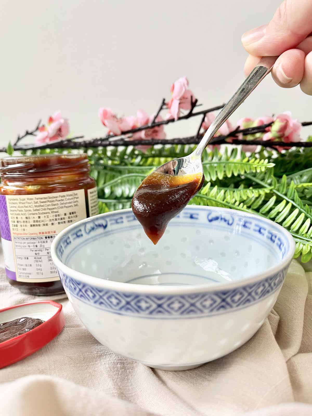 A teaspoon full of thick hoisin sauce.