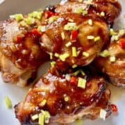5 pieces of baked char sit chicken thighs.