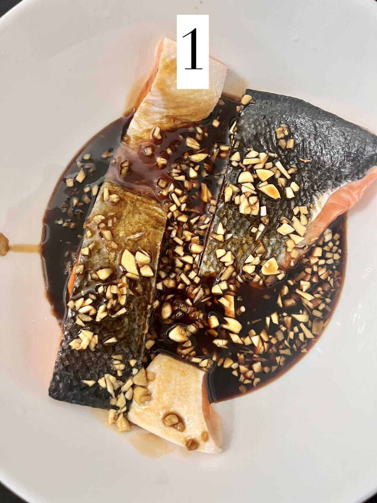 Marinating salmon fillets in honey, rice vinegar, oyster sauce, soy sauce, garlic etc