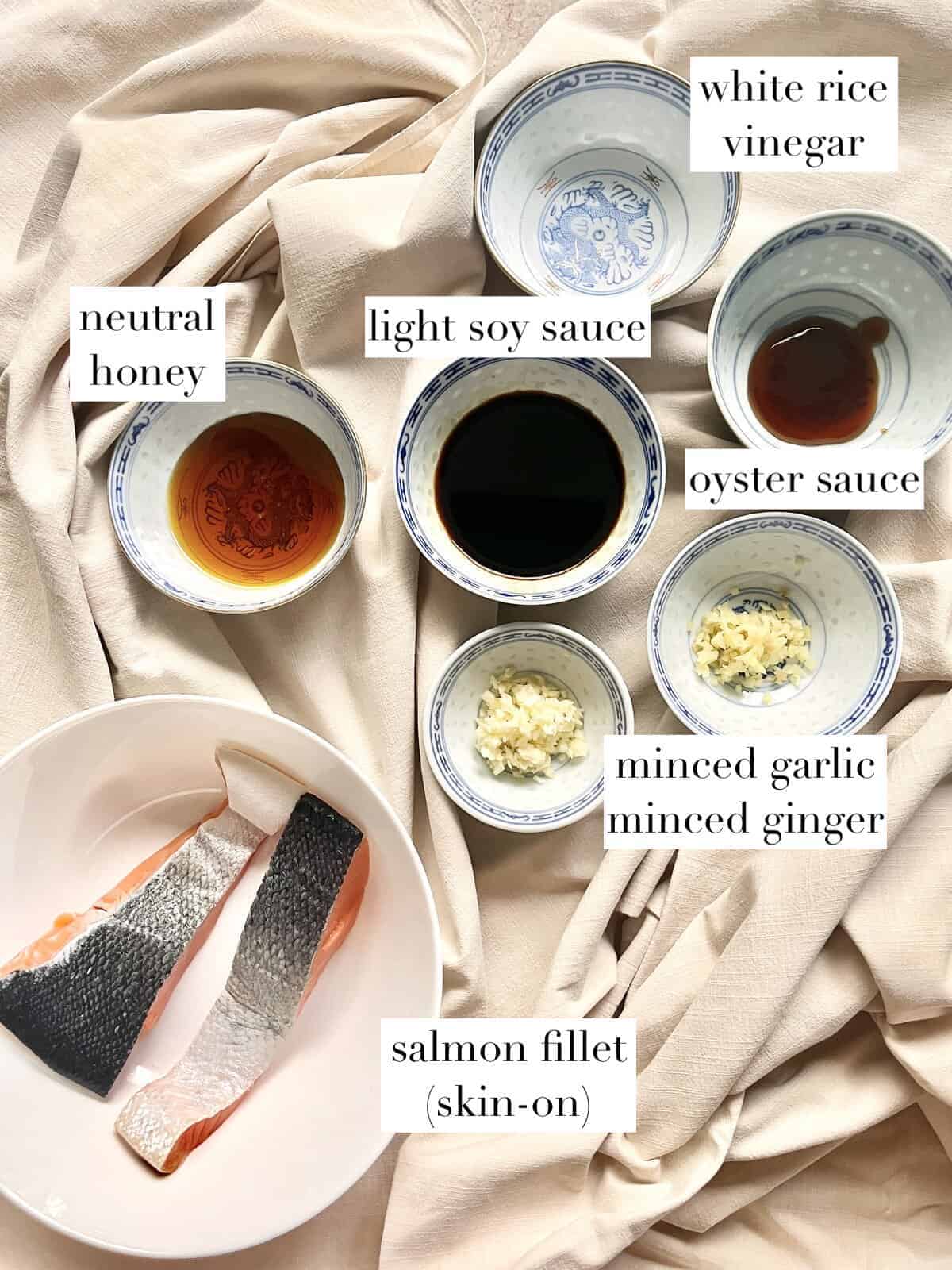 The ingredients for baked Asian Honey Garlic Salmon on a linen cloth.