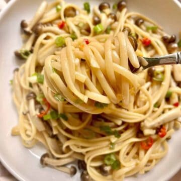 Garlic Butter Pasta Noodles with mushrooms and chili and scallions.
