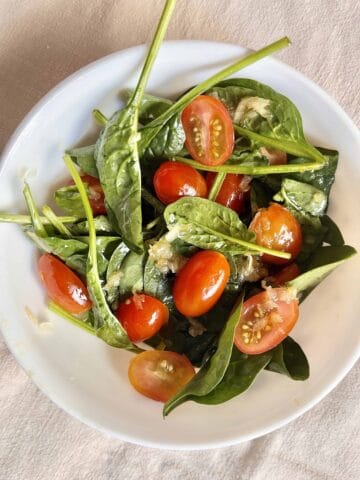 Japanese spinach and cherry tomato summer salad with onion dressing.
