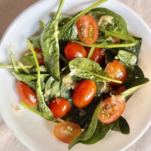 Japanese spinach and cherry tomato summer salad with onion dressing.