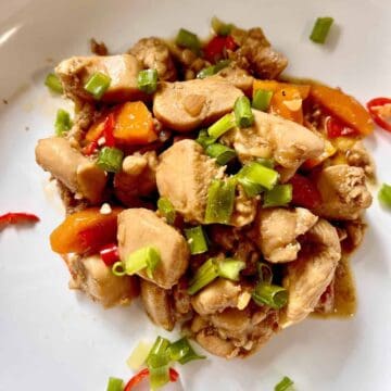 Filipino braised chicken thighs in adobo sauce.