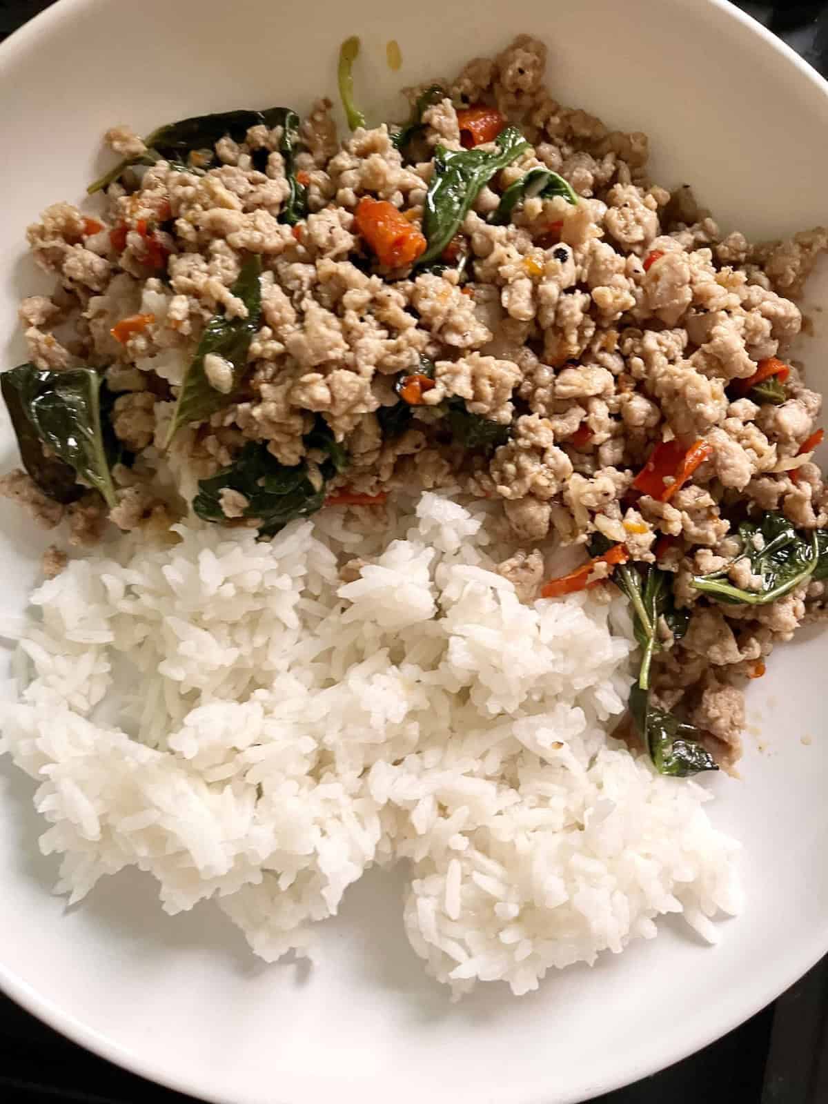 Spicy stir fried Thai pork and white rice.