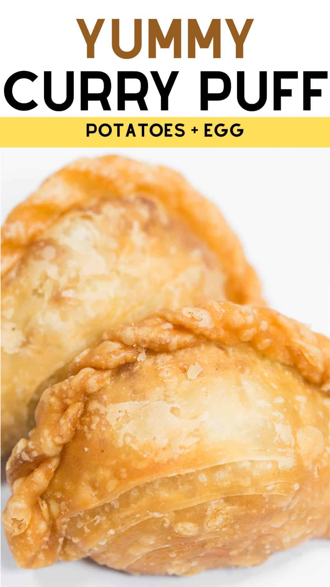 Close-up of 2 curry puffs with "Yummy Curry Puff" written on top.