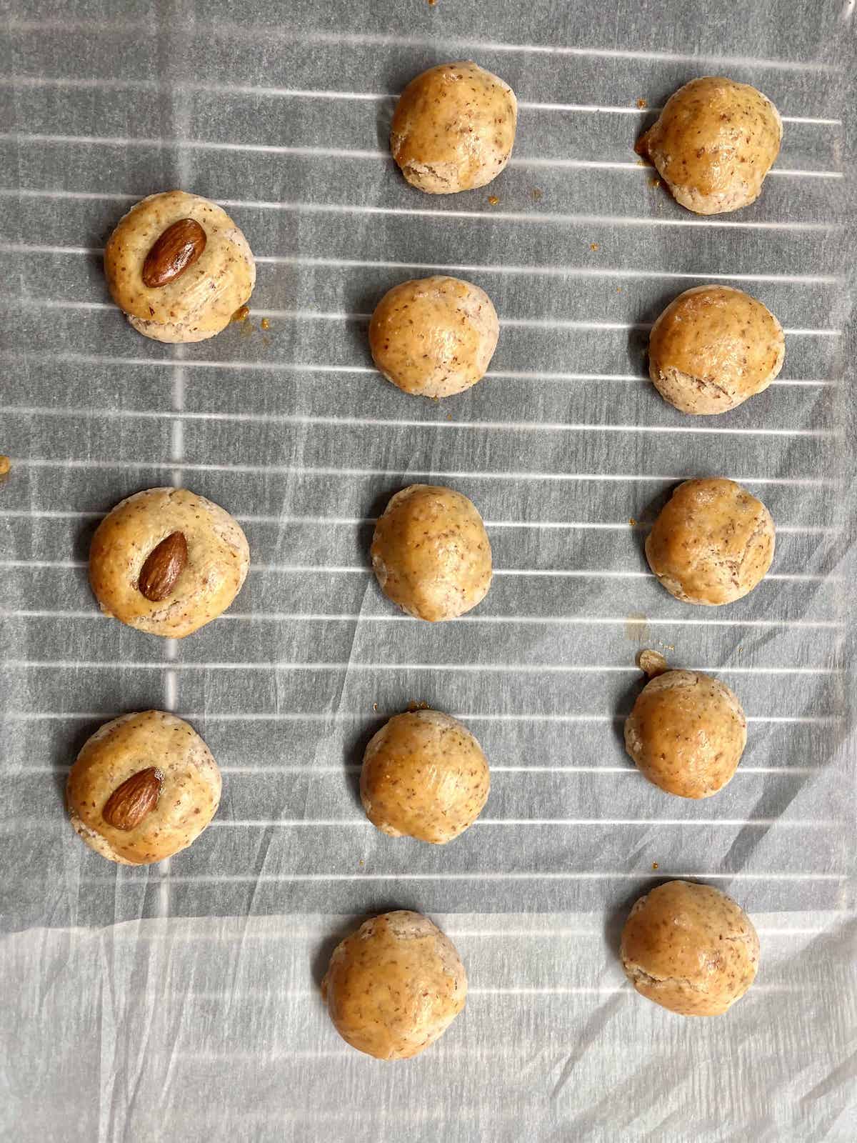 Almond cookie on a wire tray before baking.