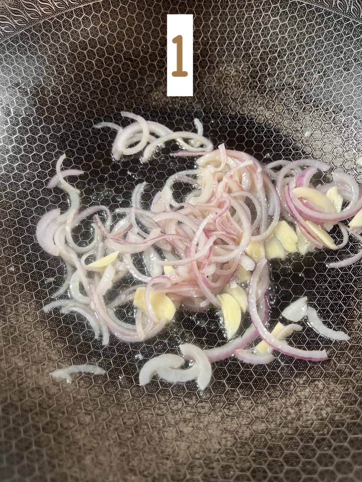 Stir frying onions and garlic.