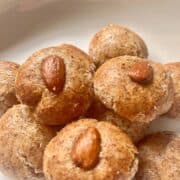 Naturally vegan Chinese Almond Cookies on a white plate.