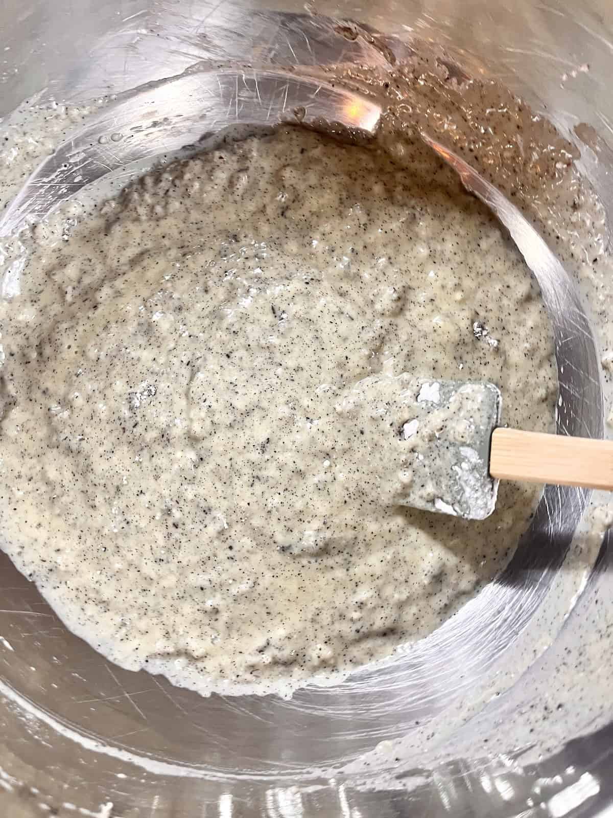 Mixing the dry and wet ingredients for oolong tea cake.